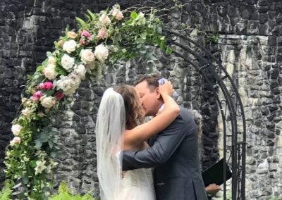 Wedding kiss under the Arbor